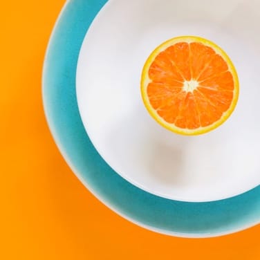 Orange slice in a bowl.